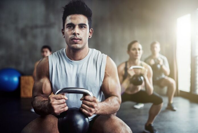 killing-that-kettlebell-workout-royalty-free-image-637772778-1562688657