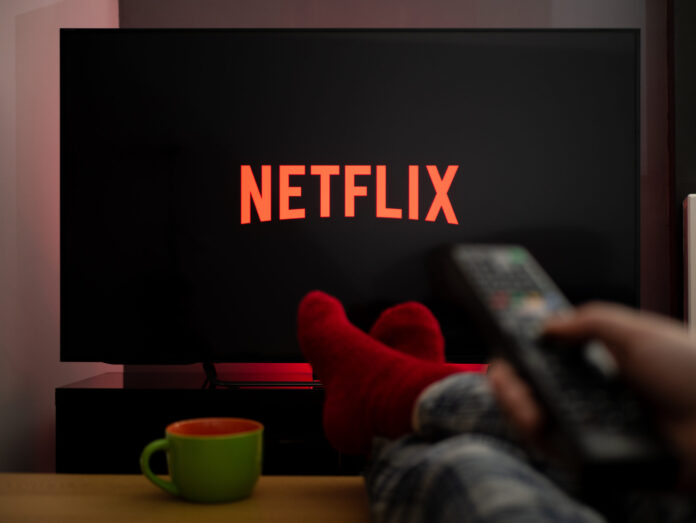 Uk, March 2020: Tv Television Feet Up Watching Netflix On Tv